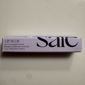 Saje Surreal Lipstick in Red and Gray